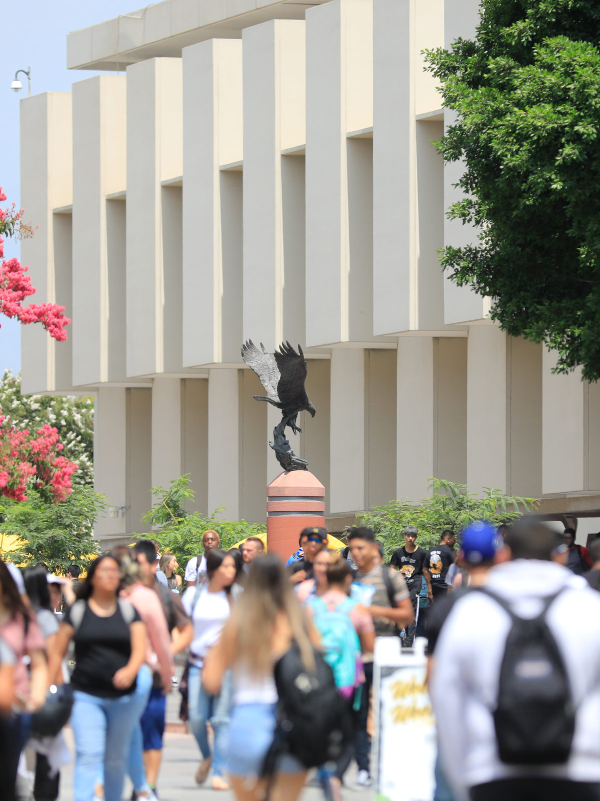 A statue of an eagle in the distance.