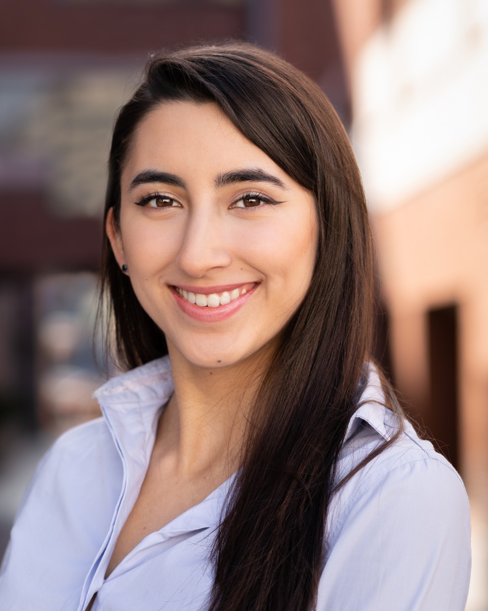 Student smiling at camera