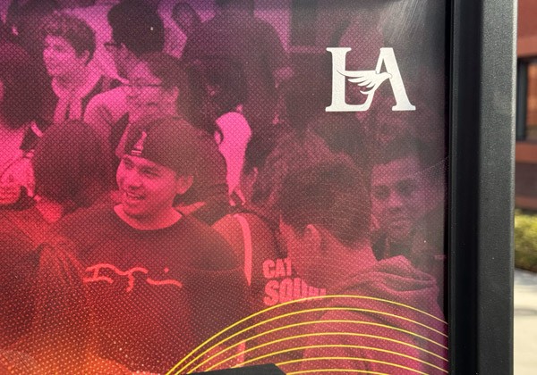 Cal State LA logo on a colorful poster.