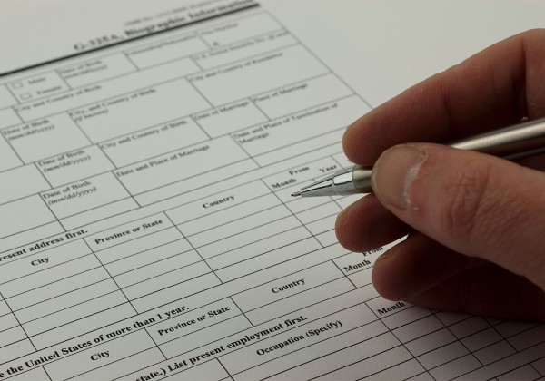 person filling out form