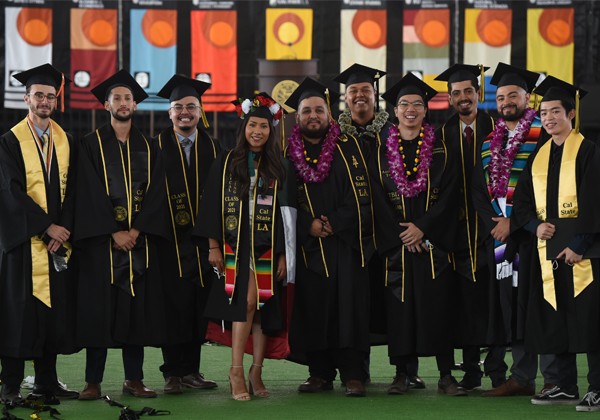 ecst student in cap and gown during commencement