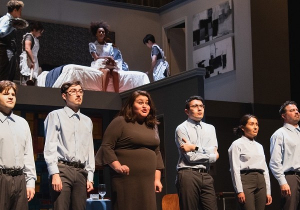 Cast members of "We the Invisibles" stand onstage facing the audience.