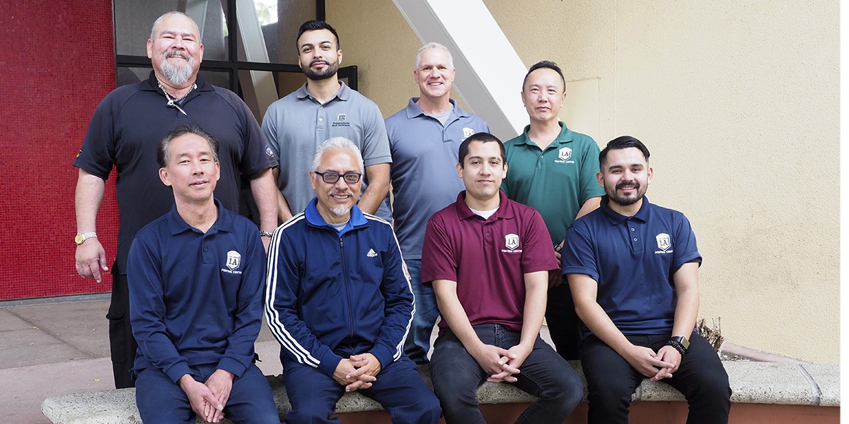 group photo of printing center staff members