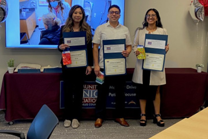 Cohort #2 posing with their certificates. 