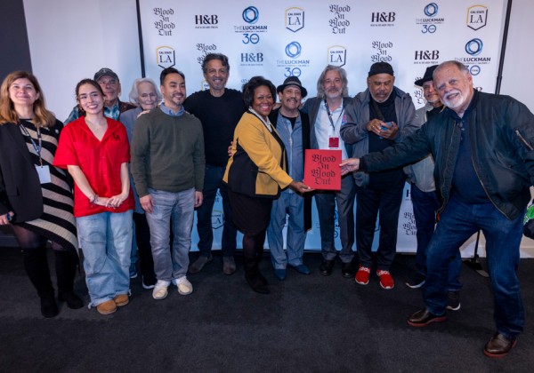 A group photo with the cast of "Blood In Blood Out" and Cal State LA president, Berenecea Eanes.