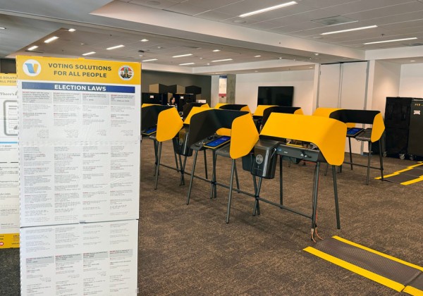 A voting center with electronic voting booths.