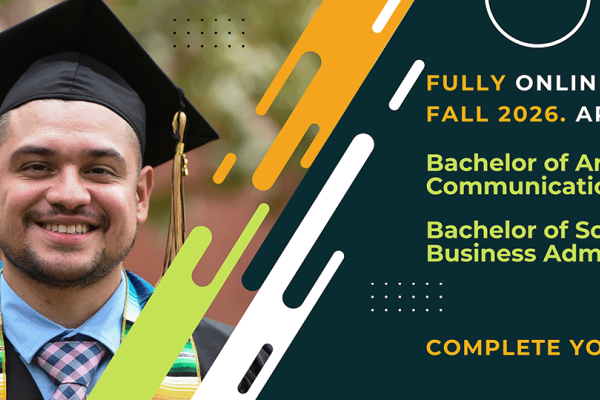 Male Cal State LA graduate wearing a black cap and gown.