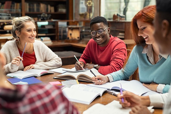 students meeting at table