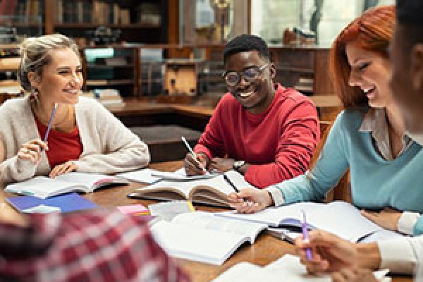 students meeting at table