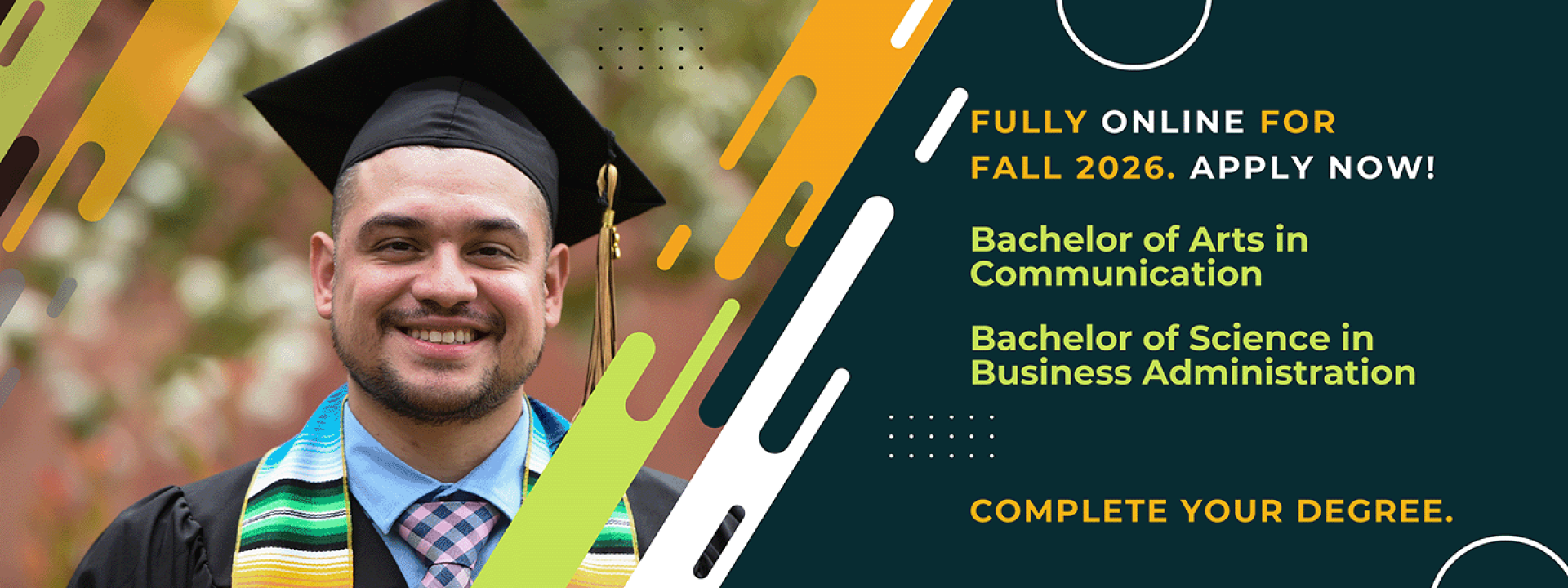 Male Cal State LA graduate wearing a black cap and gown.