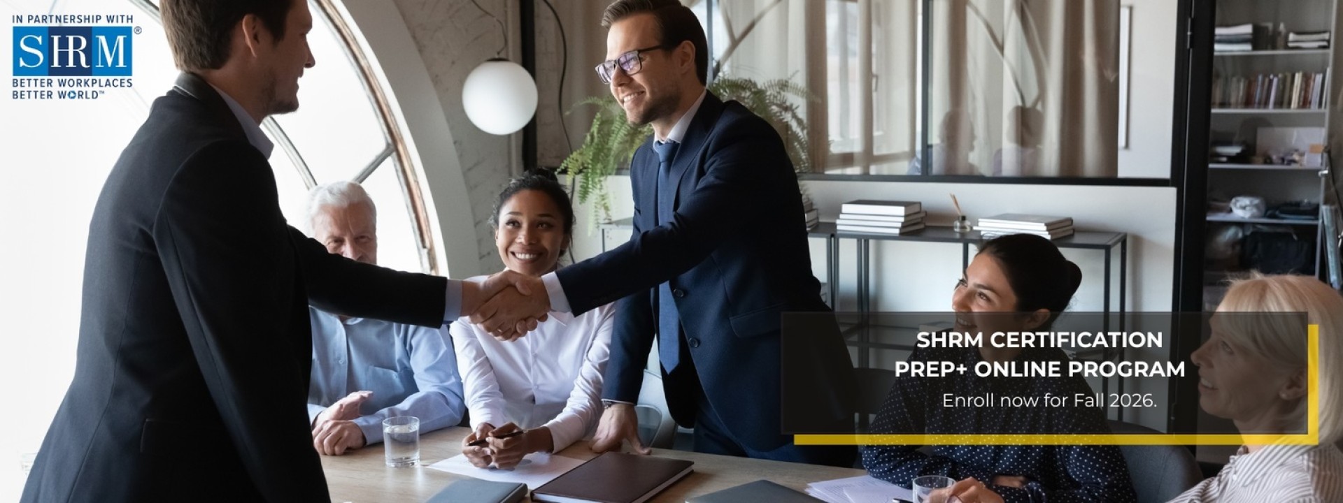 SHRM Logo. Two professionals shaking hands during a business meeting.