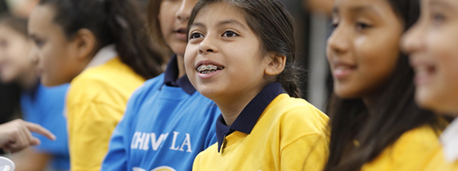 Children in Achieve LA shirts